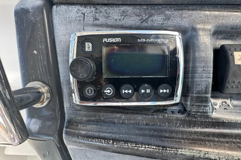 Slide: The Image of Dashboard gauges of a 2016 Monterey 295 Sport Yacht, showing fuel, RPM, and trim indicators. - 43