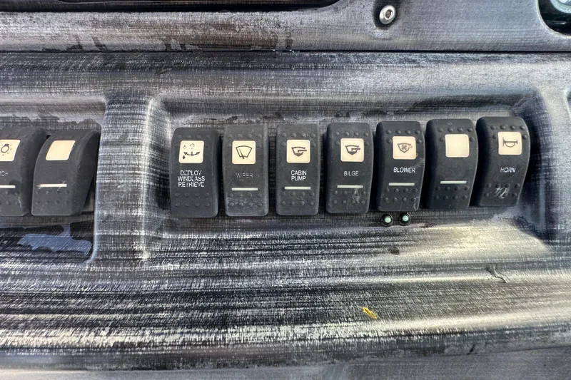 Slide: The Image of Dashboard of a 2016 Monterey 295 Sport Yacht with gauges and controls. - 45