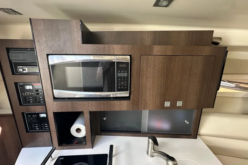 Slide: The Image of Luxurious interior of 2016 Monterey 295 Sport Yacht with plush seating and modern design. - 53