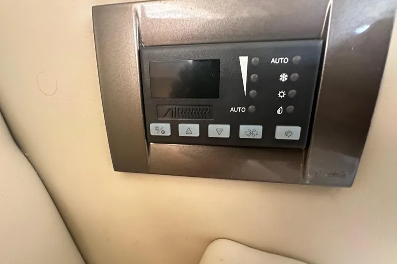 Slide: The Image of Interior of 2016 Monterey 295 Sport Yacht with modern kitchen and seating area. - 68