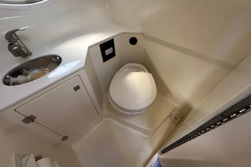 Slide: The Image of Interior view of 2016 Monterey 295 Sport Yacht with wooden door and steps. - 73