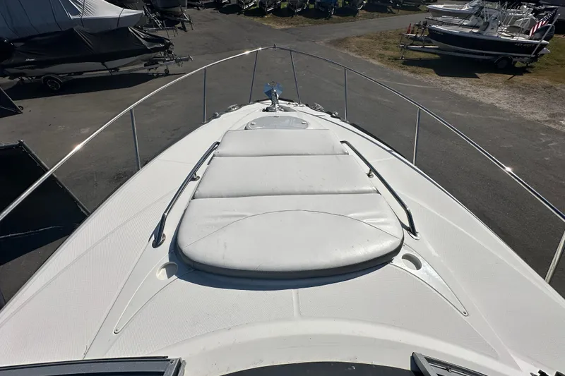 Slide: The Image of 2016 Monterey 295 Sport Yacht bathroom with sink, toilet, and storage cabinet. - 76