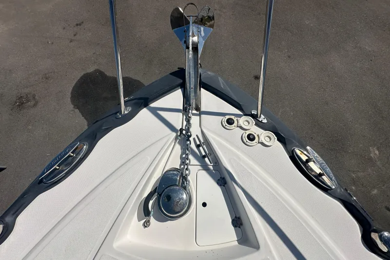 Slide: The Image of 2016 Monterey 295 Sport Yacht bow with sunpad and railing. - 80