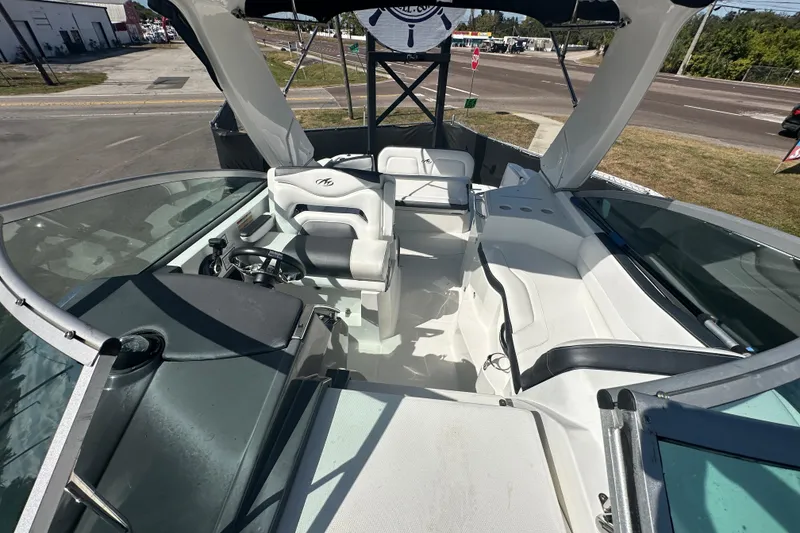 Slide: The Image of 2016 Monterey 295 Sport Yacht bow with sun pad and railing. - 88