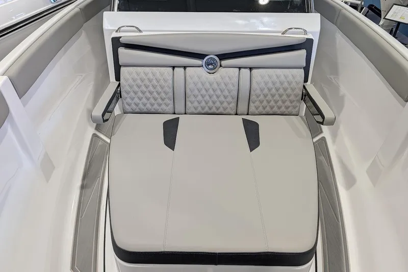 Slide: The Image of 2026 Monterey Elite 25 OB boat interior with luxurious seating and modern design. - 17
