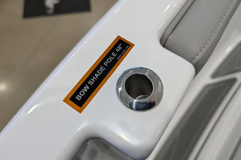 Slide: The Image of 2026 Monterey Elite 25 OB boat detail with bow shade pole holder. - 23