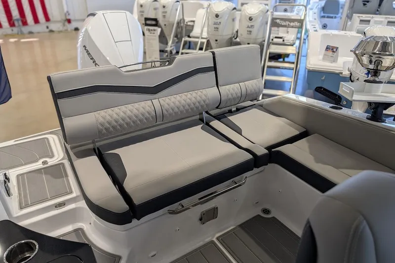 Slide: The Image of 2026 Monterey Elite 25 OB boat interior with luxurious seating and modern design. - 5