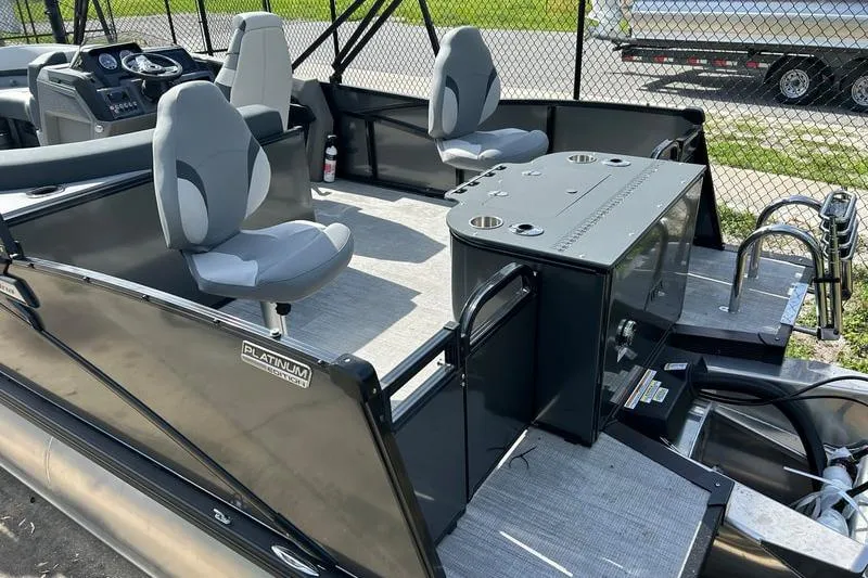 Slide: The Image of 2025 Avalon Catalina Rear Fish boat interior with seating and control panel. - 6