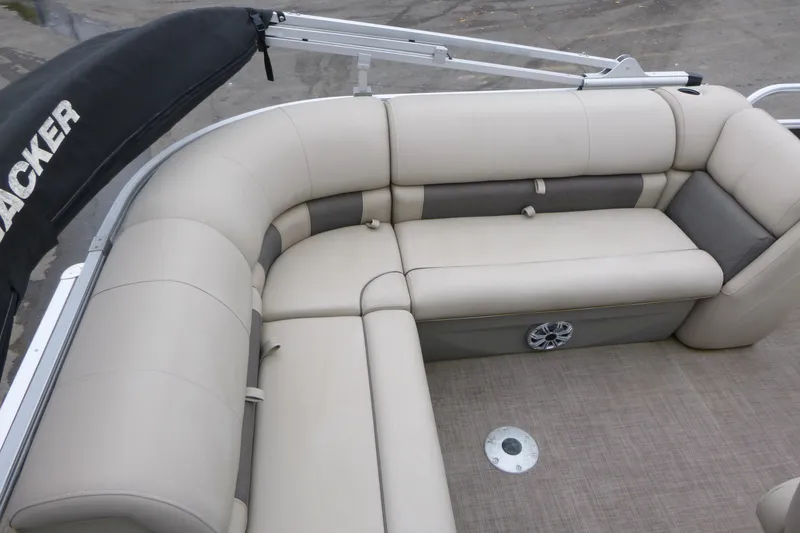 Slide: The Image of 2023 Sun Tracker Party Barge 20 DLX with beige seating and speaker system. - 11
