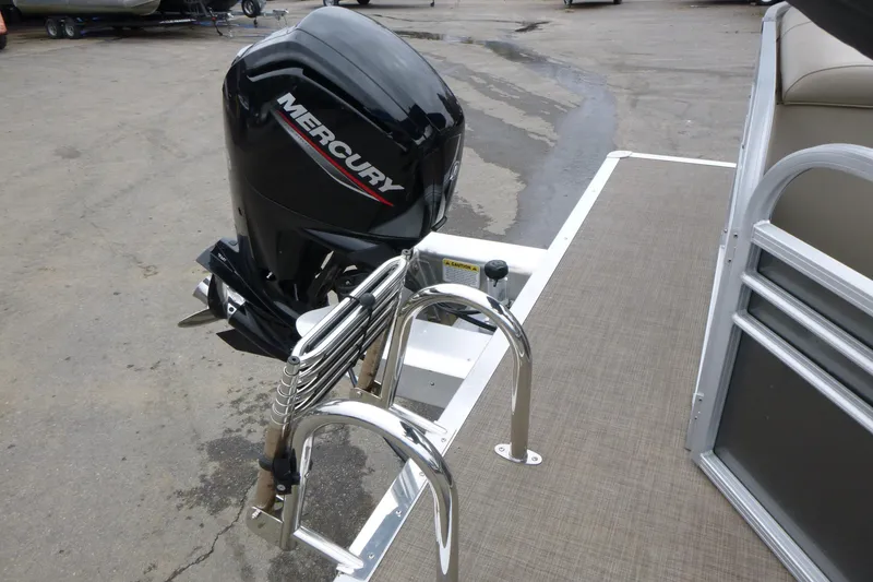 Slide: The Image of 2023 Sun Tracker Party Barge 20 DLX with Mercury outboard motor and swim ladder. - 6