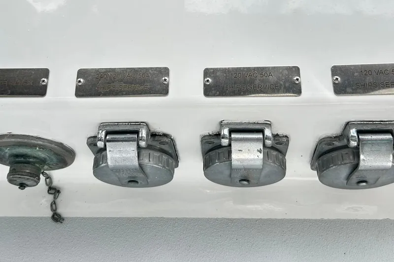 Slide: The Image of Electrical outlets on a 1979 Hatteras 53 Motor Yacht Hard Top, labeled for ship's service. - 127