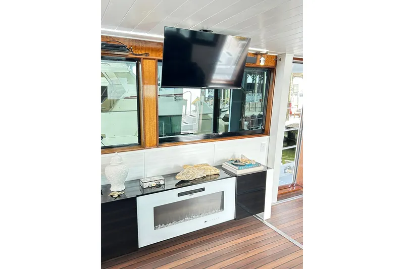Slide: The Image of Interior of 1979 Hatteras 53 Motor Yacht with TV and modern decor. - 24