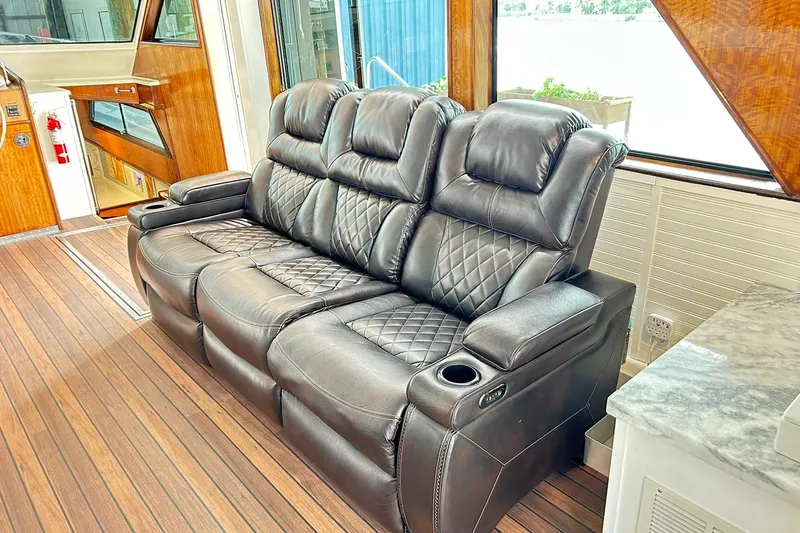 Slide: The Image of Luxurious leather seating inside a 1979 Hatteras 53 Motor Yacht Hard Top. - 29