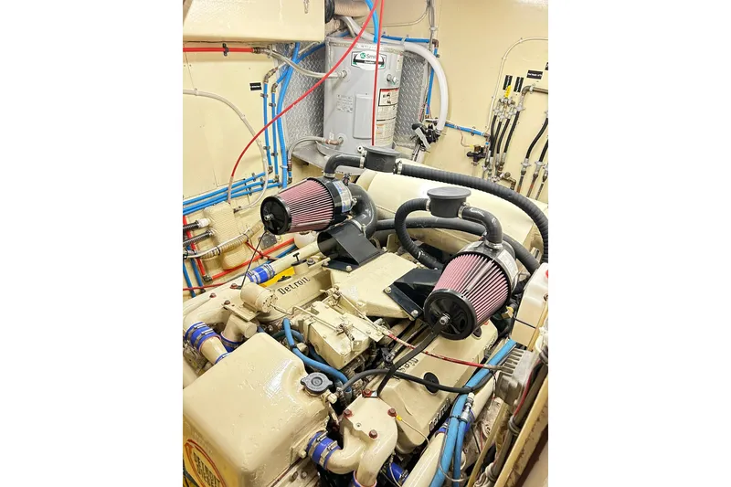 Slide: The Image of Engine room of 1979 Hatteras 53 Motor Yacht Hard Top with visible components. - 91