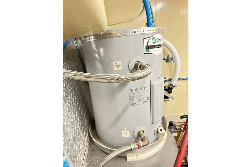 Slide: The Image of Water heater in 1979 Hatteras 53 Motor Yacht Hard Top engine room. - 95