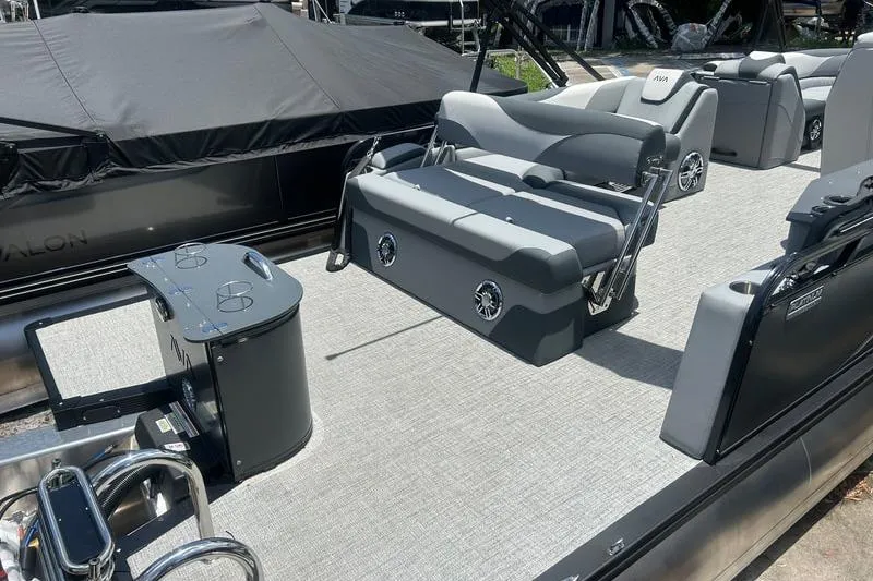 Slide: The Image of 2025 Avalon LSZ Cruise Rear Bench pontoon boat with sleek seating and modern design. - 6