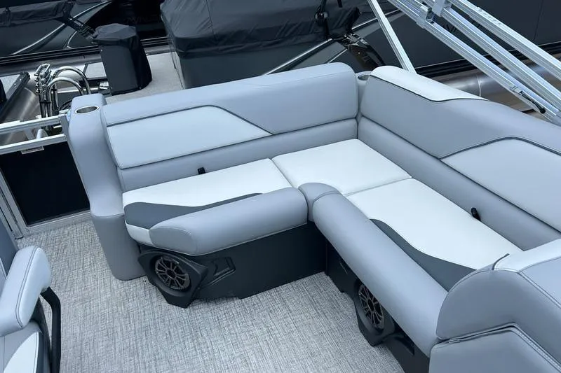 Slide: The Image of 2025 Avalon 19 Venture rear bench with sleek gray upholstery and modern design. - 4