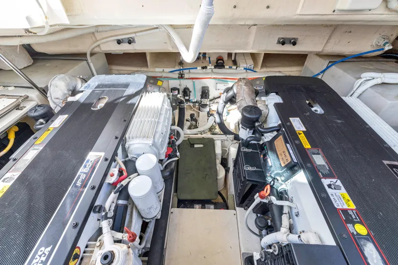 Slide: The Image of Engine room of 2011 Tiara Yachts 4300 Sovran, featuring dual Volvo Penta engines. - 36