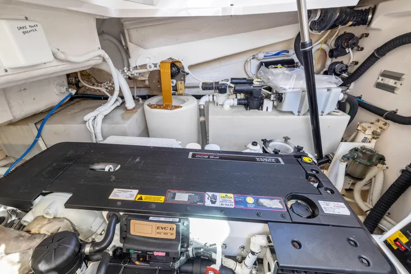 Slide: The Image of Engine room of 2011 Tiara Yachts 4300 Sovran, showcasing mechanical components and systems. - 38