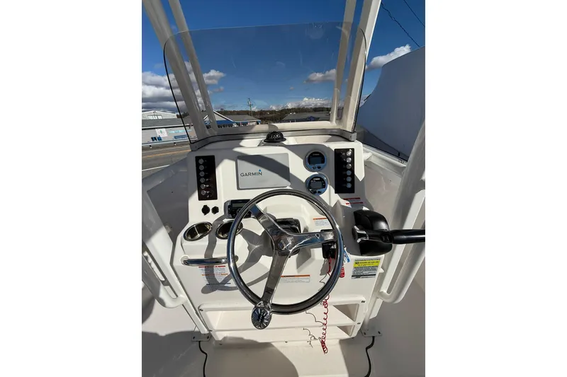 Slide: The Image of 2021 Robalo R222 Explorer boat dashboard with Garmin navigation system. - 5