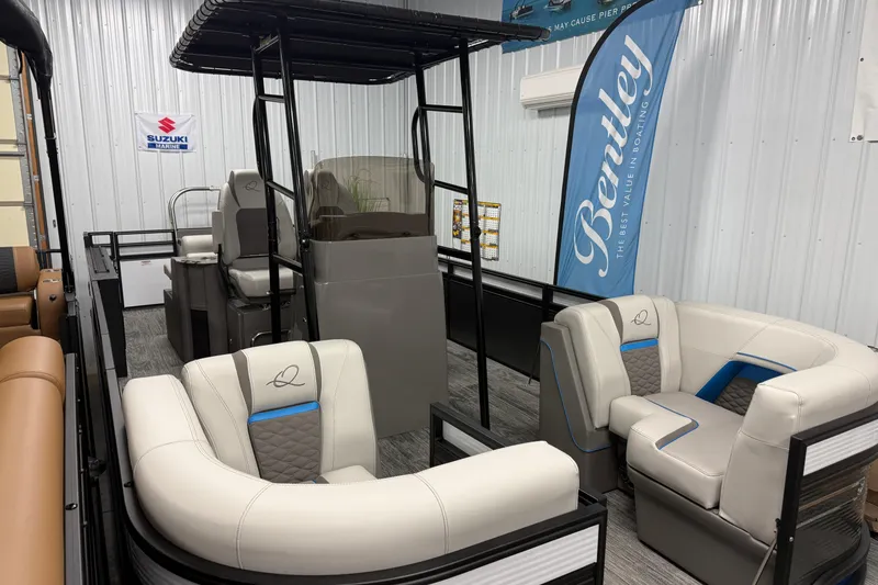 The Image of 2026 Qwest M-Class 22 Pro Sport boat interior with plush seating and modern design. - 1