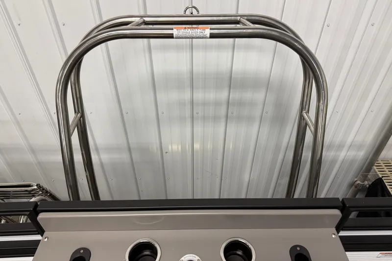 Slide: The Image of Stainless steel frame of 2026 Qwest M-Class 22 Pro Sport boat against metal wall. - 14