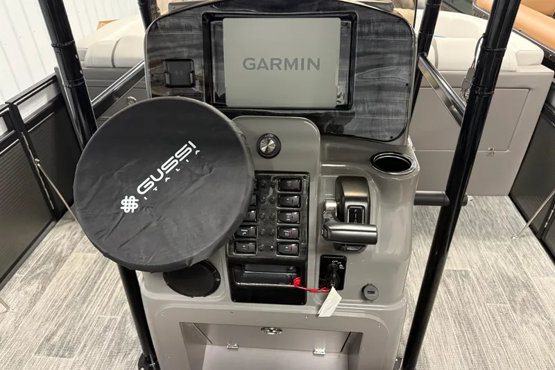 Slide: The Image of 2026 Qwest M-Class 22 Pro Sport dashboard with Garmin display and Gussi Italia steering wheel. - 18