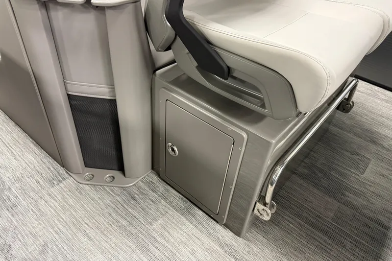 Slide: The Image of 2026 Qwest M-Class 22 Pro Sport boat seat and storage compartment detail. - 22