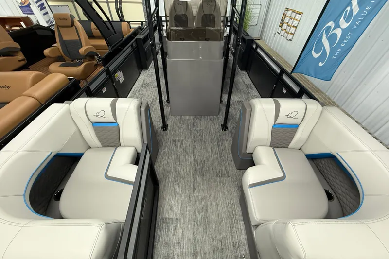 Slide: The Image of Interior of 2026 Qwest M-Class 22 Pro Sport boat with luxurious seating and modern design. - 26