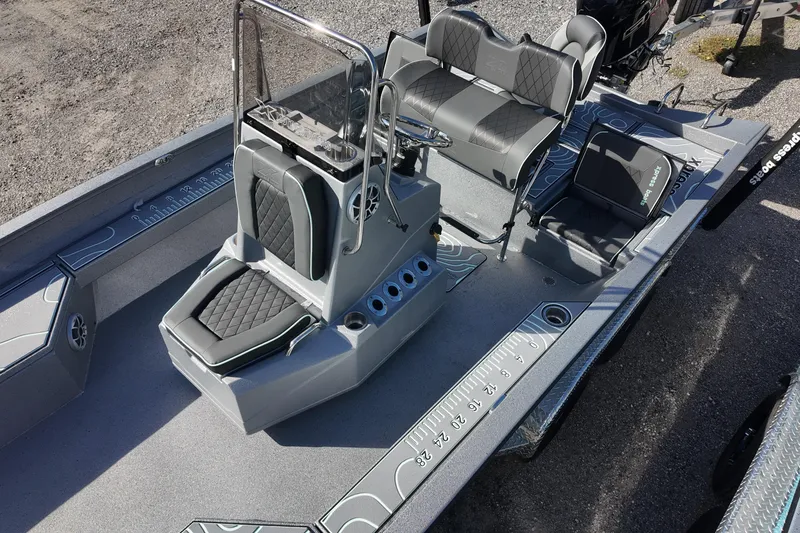 Slide: The Image of 2026 Xpress H22B Bay boat interior with sleek seating and modern console design. - 11