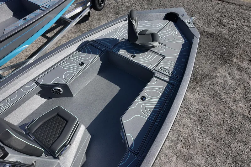 Slide: The Image of 2026 Xpress H22B Bay boat with stylish seating and modern design on display. - 9