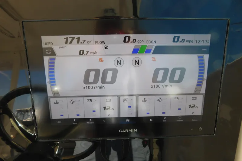 Slide: The Image of Garmin display on 2024 Pursuit DC 326 Dual Console showing speed and fuel data. - 39