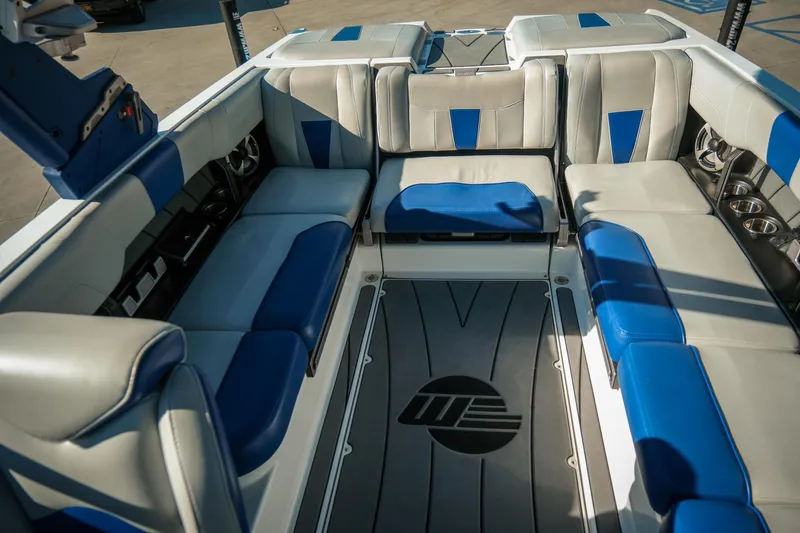 Slide: The Image of 2021 Malibu Wakesetter 23 LSV interior with blue and gray seating. - 20
