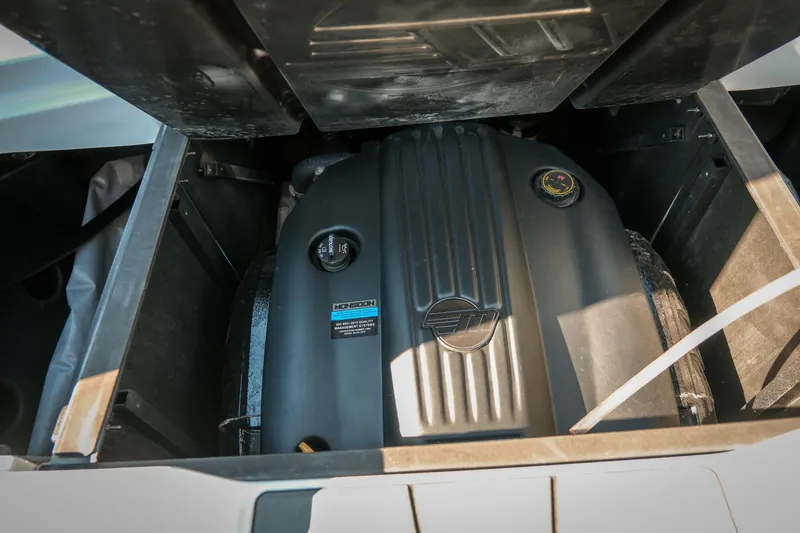 Slide: The Image of 2021 Malibu Wakesetter 23 LSV engine compartment showcasing Monsoon engine. - 28