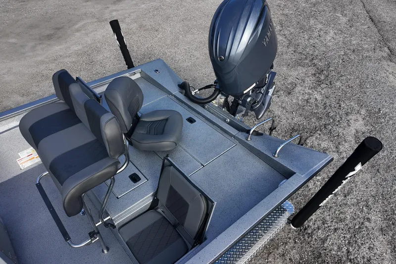 Slide: The Image of 2026 Xpress H22B Bay boat interior with seating and motor, showcasing modern design. - 13