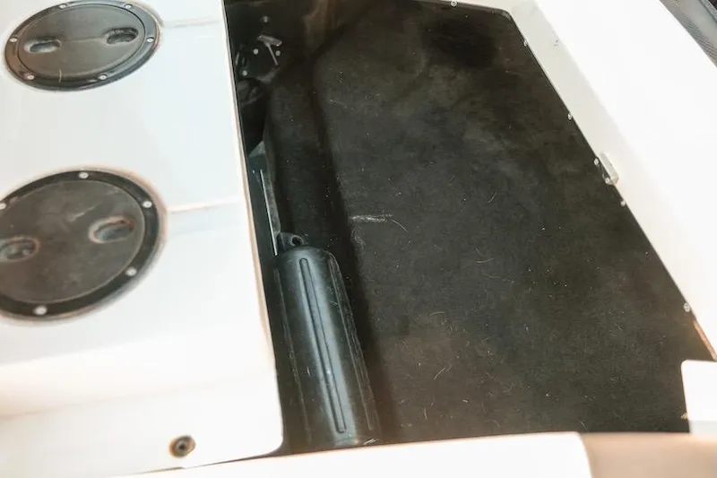 Slide: The Image of Interior view of a 2014 Centurion Enzo SV233 boat storage compartment. - 21