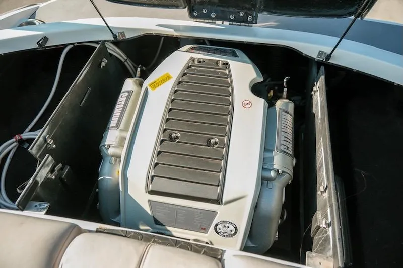 Slide: The Image of 2014 Centurion Enzo SV233 boat engine compartment with open cover. - 23