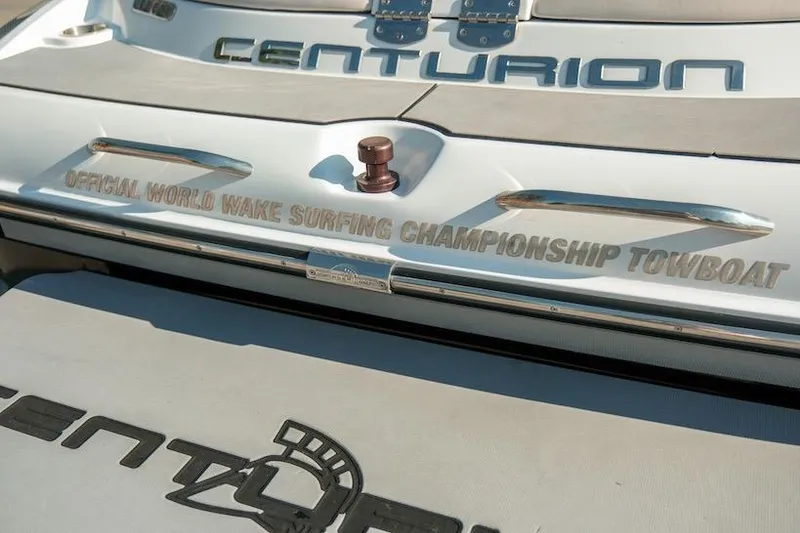 Slide: The Image of 2014 Centurion Enzo SV233 boat, official World Wake Surfing Championship towboat branding. - 29