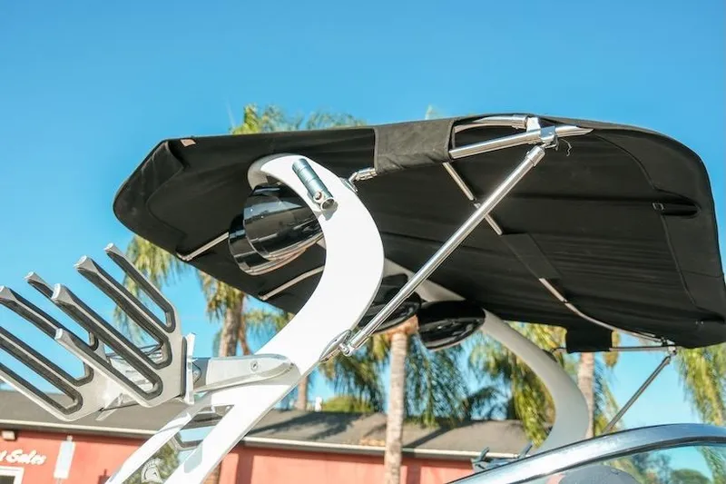 Slide: The Image of 2014 Centurion Enzo SV233 boat tower with black canopy and wakeboard rack. - 32