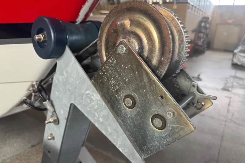 Slide: The Image of 2017 Formula 240 Bowrider boat, red and white exterior, close-up of seating area. - 12