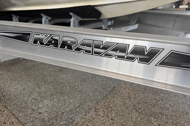 Slide: The Image of Bow of 2017 Formula 240 Bowrider boat with red trim and stainless steel fittings. - 14