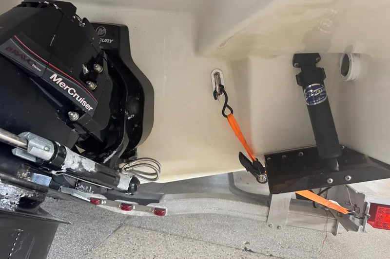 Slide: The Image of 2017 Formula 240 Bowrider boat interior with open storage compartment and seating area. - 17