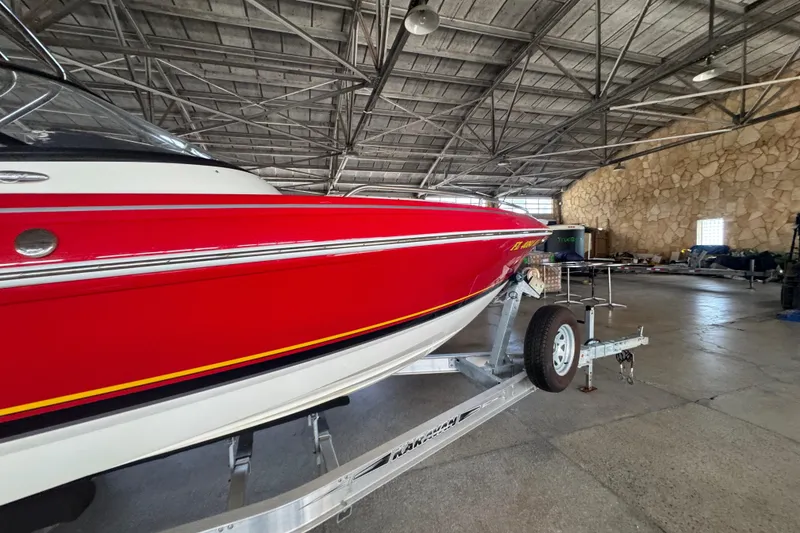 Slide: The Image of Control panel and cable port on 2017 Formula 240 Bowrider boat. - 32