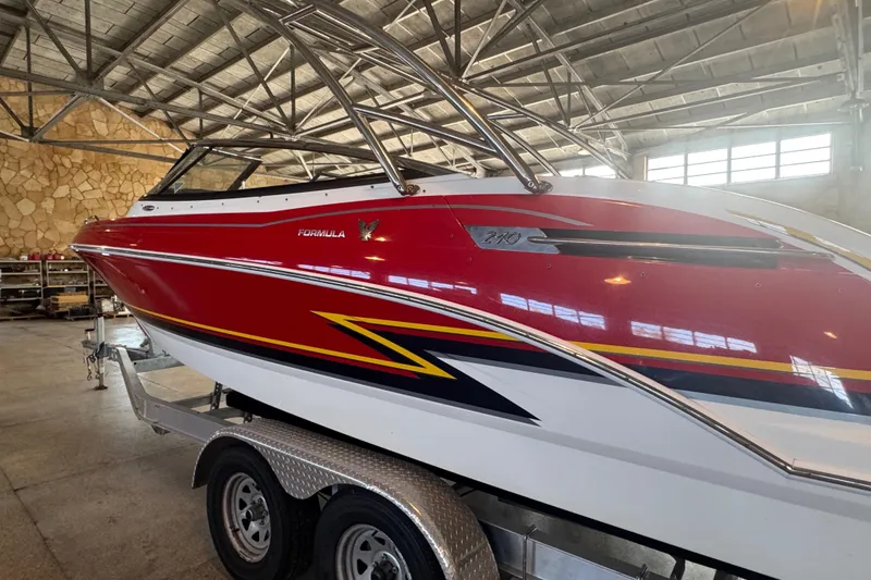 Slide: The Image of 2017 Formula 240 Bowrider interior with seating and storage compartment. - 38