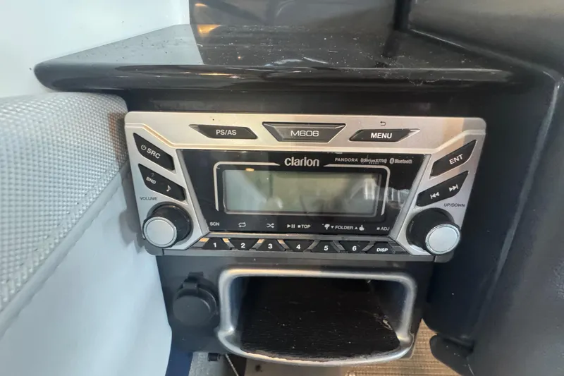 Slide: The Image of Close-up of a 2017 Formula 240 Bowrider boat propeller in a garage setting. - 51