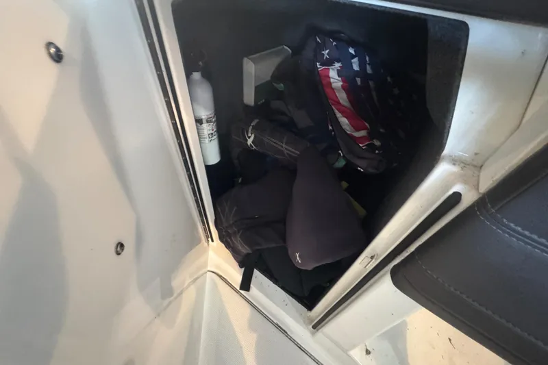 Slide: The Image of Red 2017 Formula 240 Bowrider boat on trailer in indoor storage facility. - 52