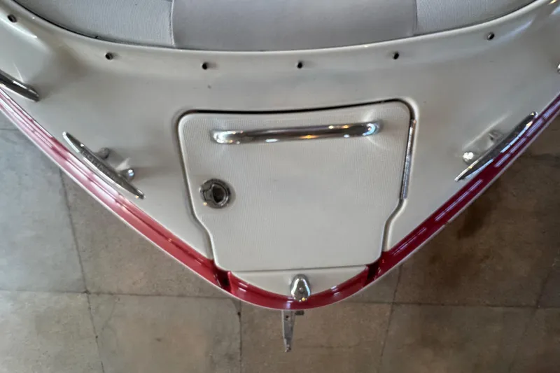 Slide: The Image of 2017 Formula 240 Bowrider boat with vibrant red and yellow design on trailer. - 54