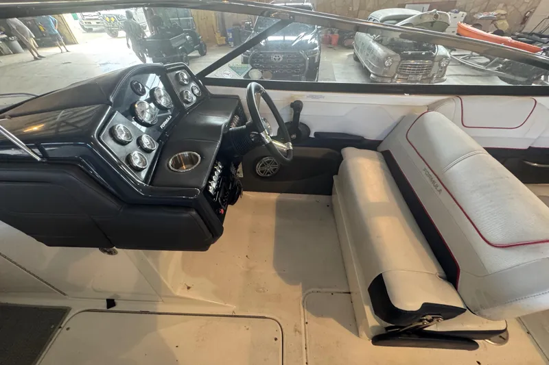 Slide: The Image of Close-up of a boat trailer winch for a 2017 Formula 240 Bowrider. - 68