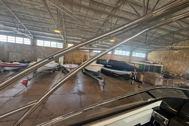 Slide: The Image of 2017 Formula 240 Bowrider boat on trailer, close-up of hull and support. - 71