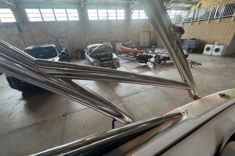 Slide: The Image of 2017 Formula 240 Bowrider in spacious indoor storage with other boats. - 73